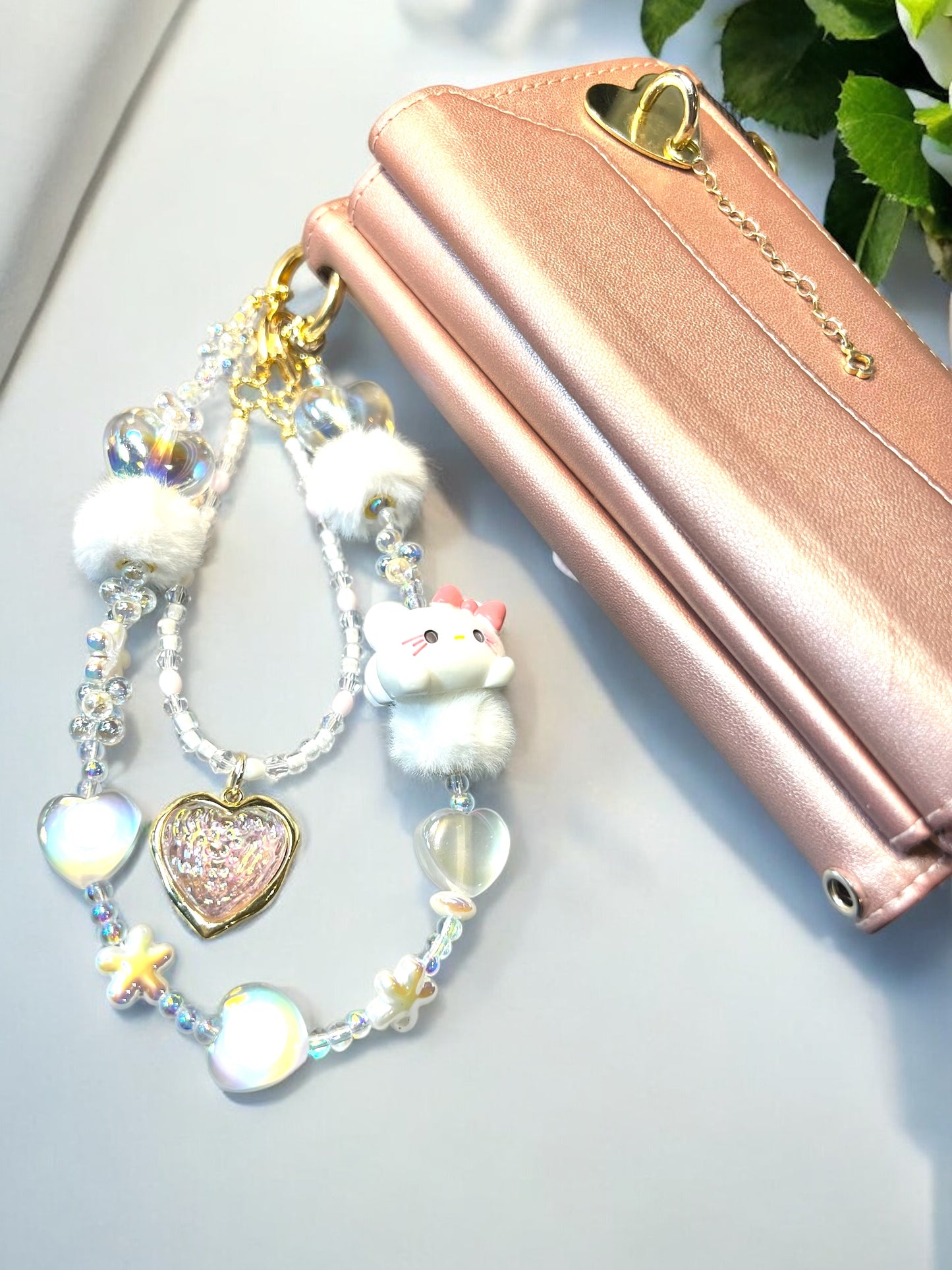 “Nola Sneaux” Handmade Glass, Pompom & Acrylic HK Bead Phone Wristlet