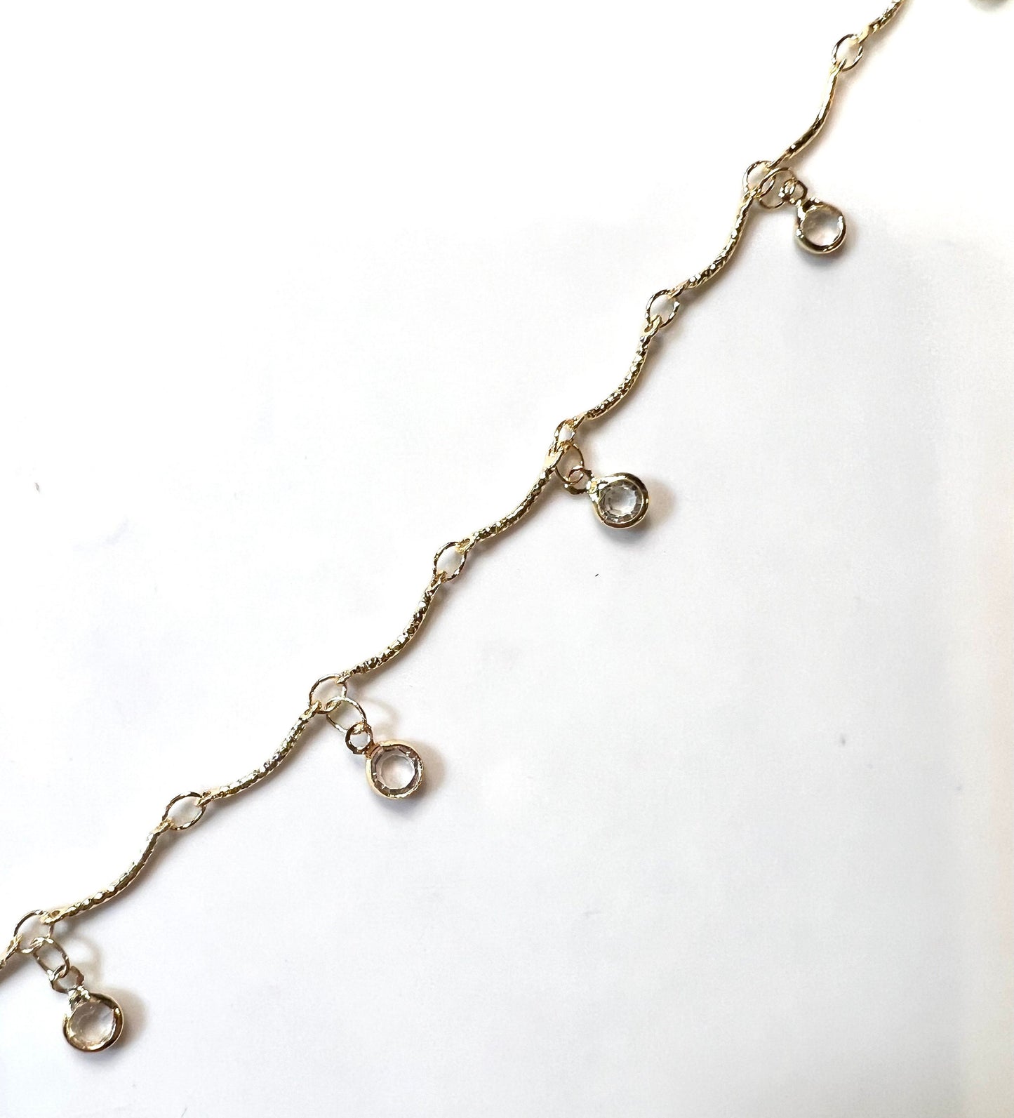 Clear Zircon Crystals on a  Dainty, Curved Gold Chain