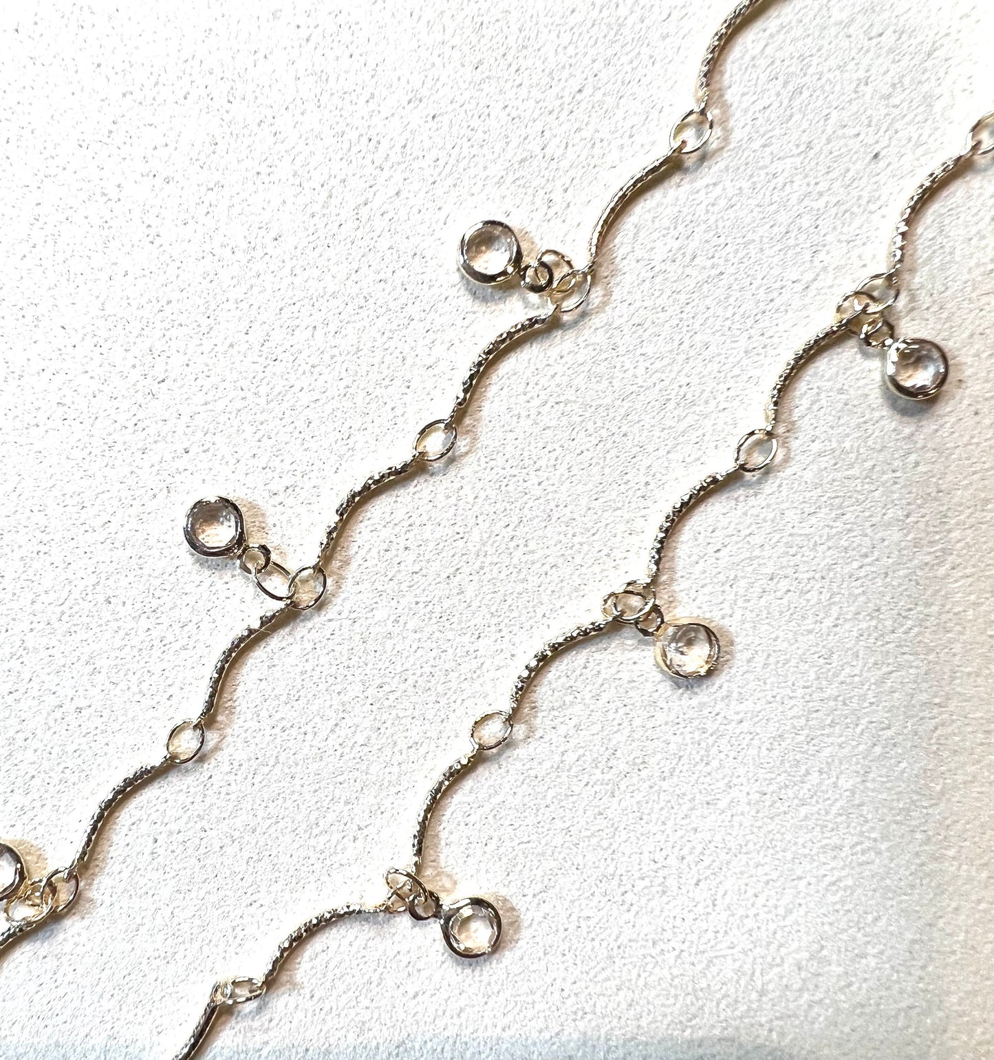 Clear Zircon Crystals on a  Dainty, Curved Gold Chain