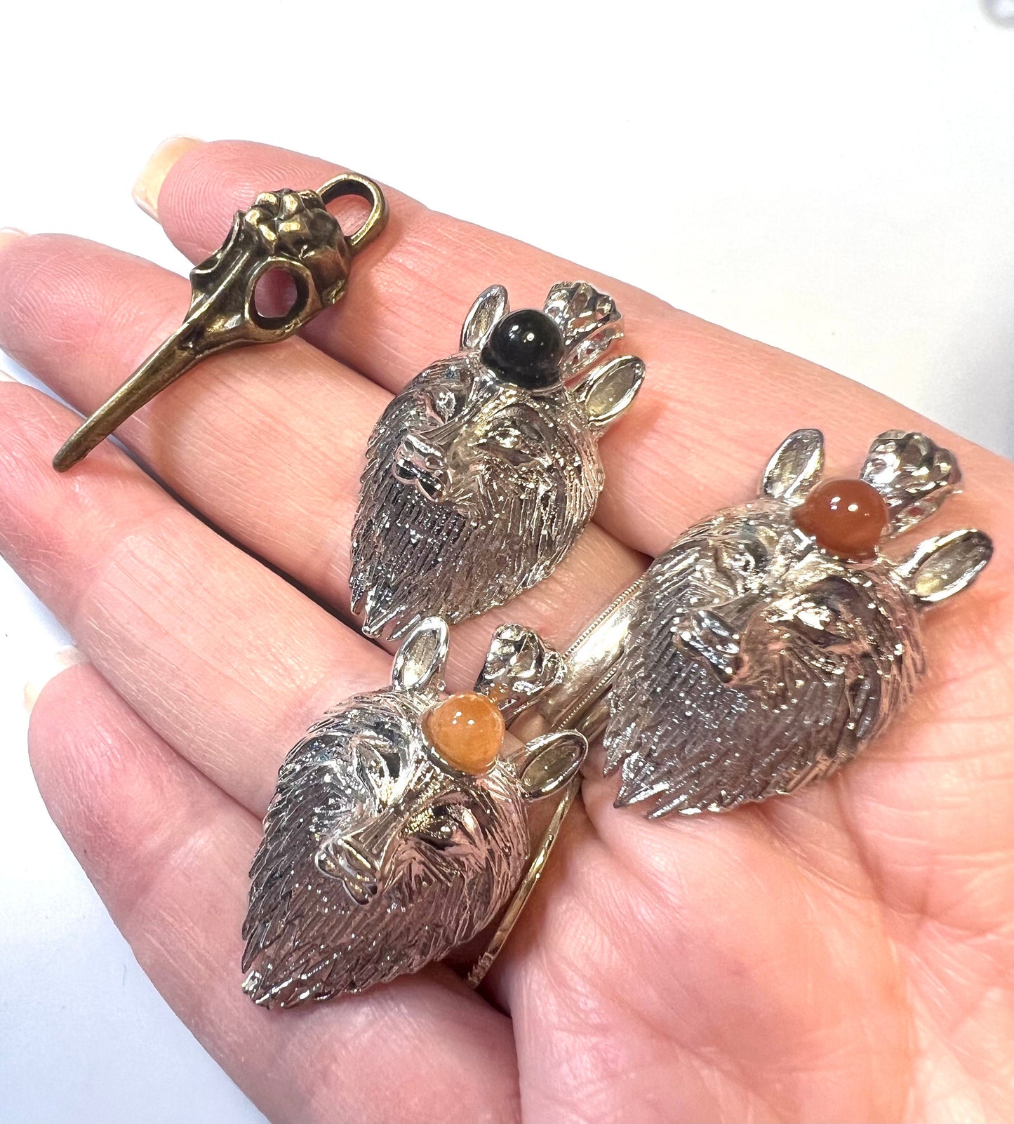 Wolf Head and Raven Skull white Copper Crystal Pendants