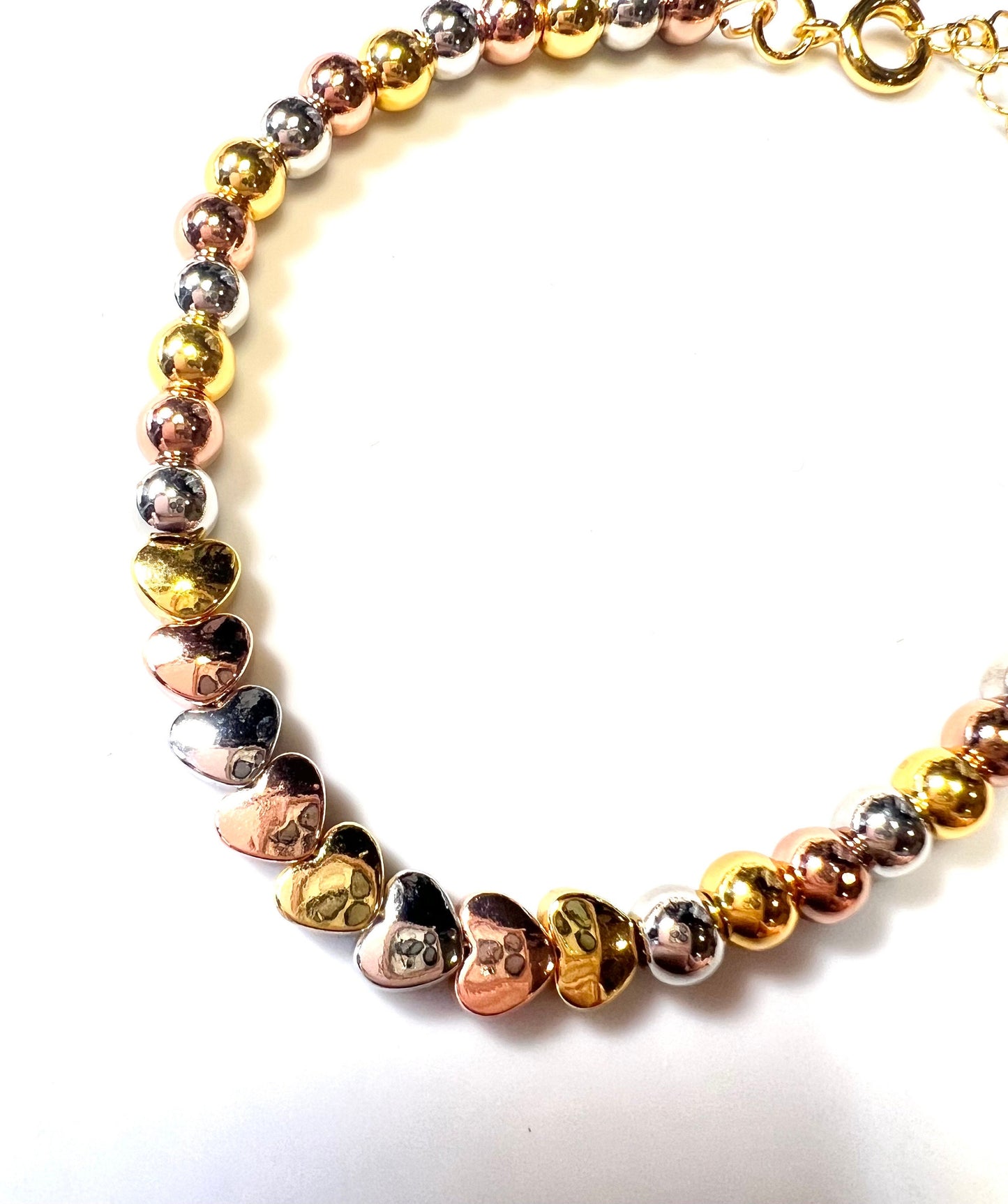 Trinity Gold tones Bracelet with beautiful heart Charms